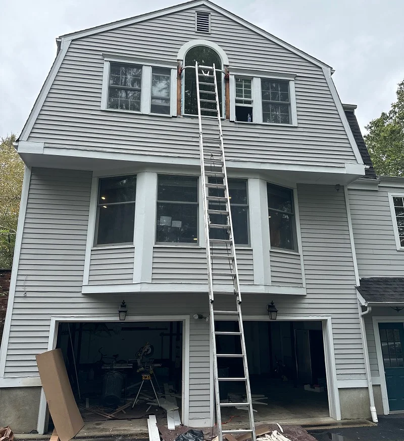 Working on the exterior trim of this Pella Lifestyles window